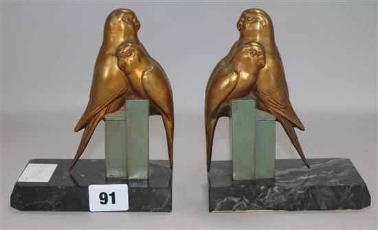 A pair of Art Deco budgie bookends height 16cm